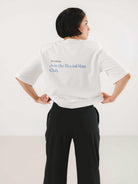 Czarne damskie szerokie spodnie treningowe (wide leg) z elastycznym pasem i kieszeniami - set z białym T-shirtem Slowdown