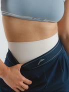 Granatowe damskie szerokie spodnie treningowe (wide leg) z elastycznym pasem i kieszeniami - set z błękitnym crop topem JOYINME
